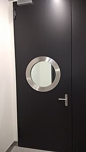 High security door in a data center with stainless steel rings made of stainless steel tubing