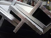 stainless t sections laserwelded sized from 20x20 up to 100x100 mm surface mirrorpolished with equal legs, after sandblasting allsides polished and grinded